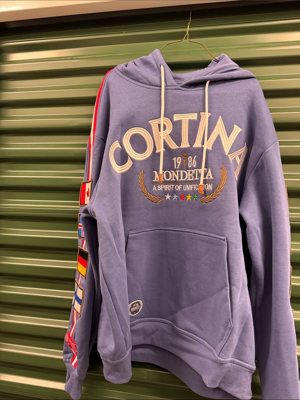 Mondetta Purple Cortina Logo Hoodie with Multicolor Sleeve Flags